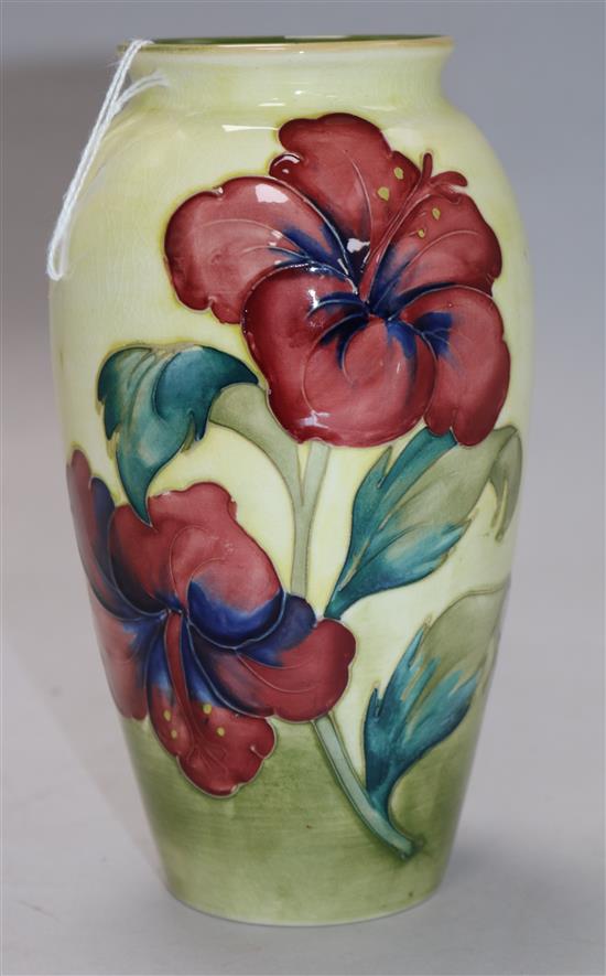 A Moorcroft Hibiscus pattern yellow ground baluster vase, H 18.5cm